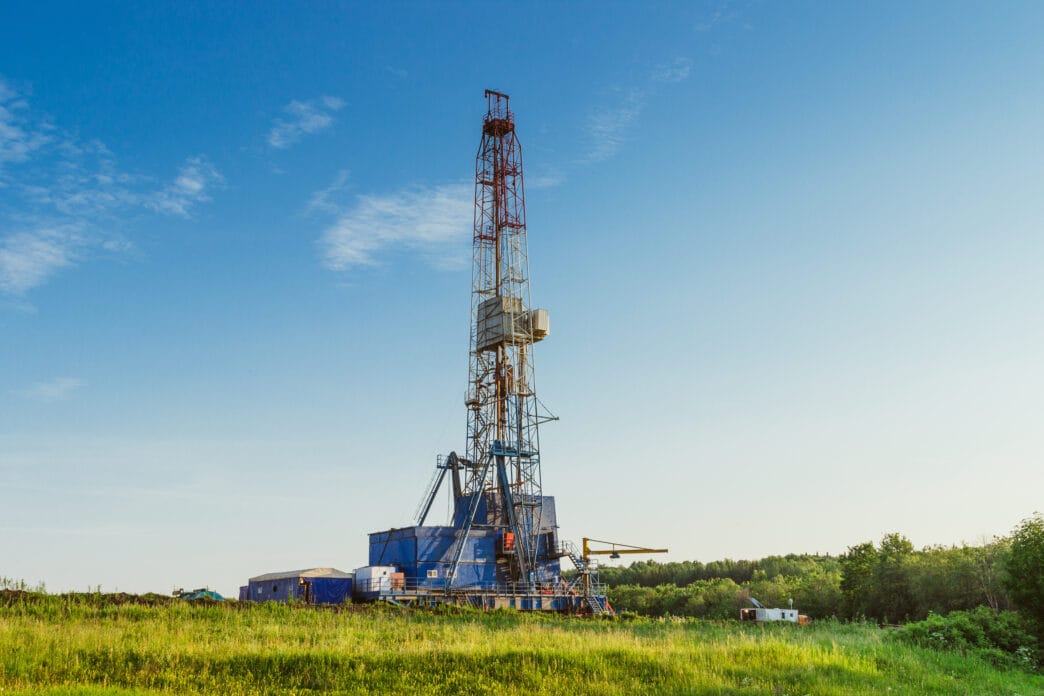 Land oil drilling rig blue sky | Meridian Source