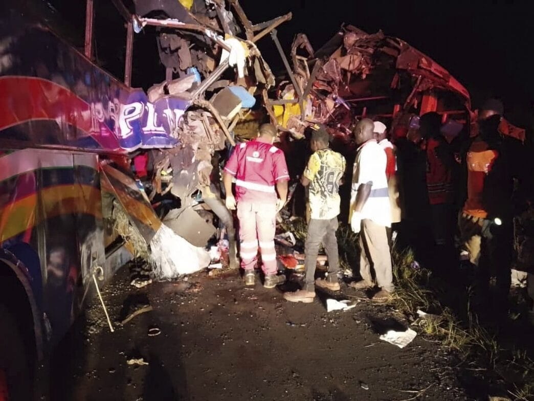 At least 63 people killed in a crash of buses and other vehicles in western Uganda