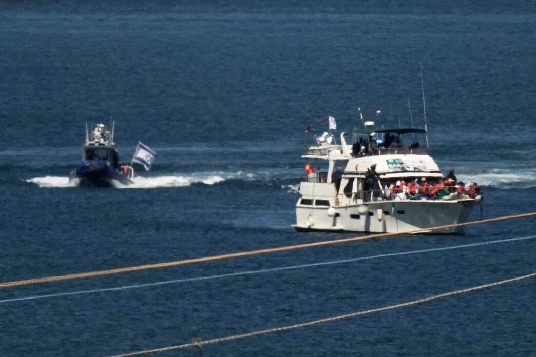 Aggregator Downloaded image for imported item 77971 | Meridian Source Israeli navy intercepts boats attempting to break Gaza blockade and arrests activists