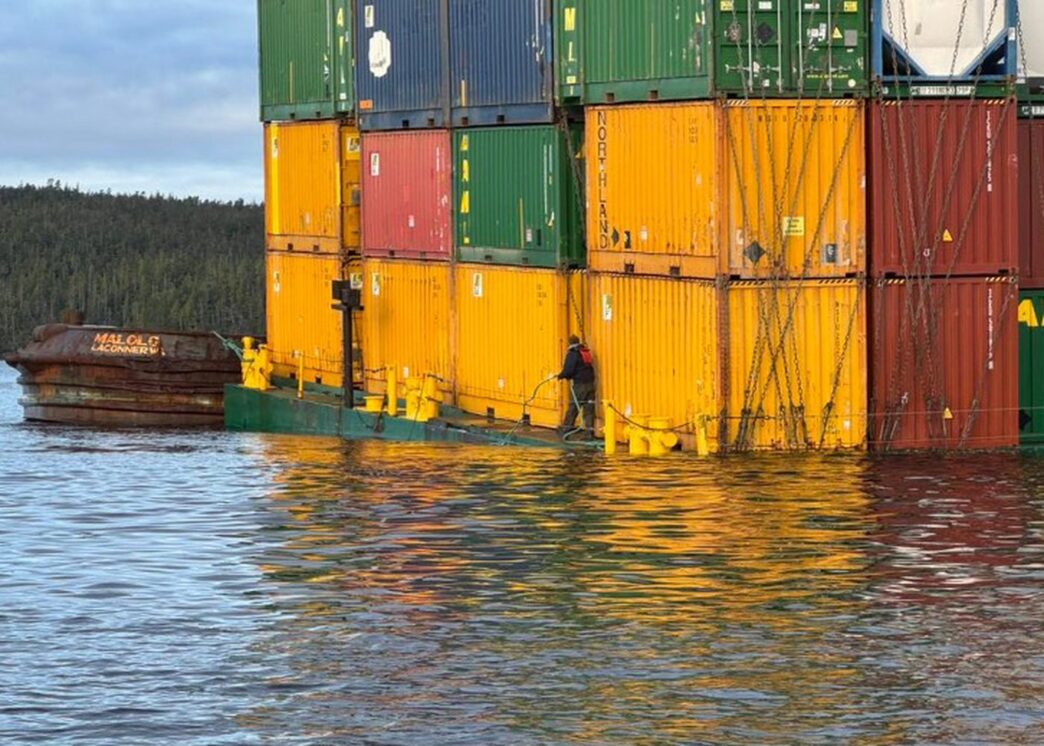 Aggregator Downloaded image for imported item 86691 | Meridian Source Cargo unloaded from sinking barge off B.C. coast as planning starts for move south