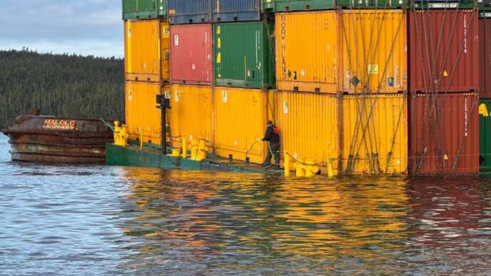 Aggregator Downloaded image for imported item 86691 | Meridian Source Cargo unloaded from sinking barge off B.C. coast as planning starts for move south