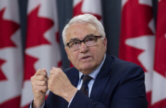 Official languages commissioner concerned about federal budget cuts