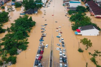 Death toll from floods in Thailand reach 145 as receding water reveals widespread damage