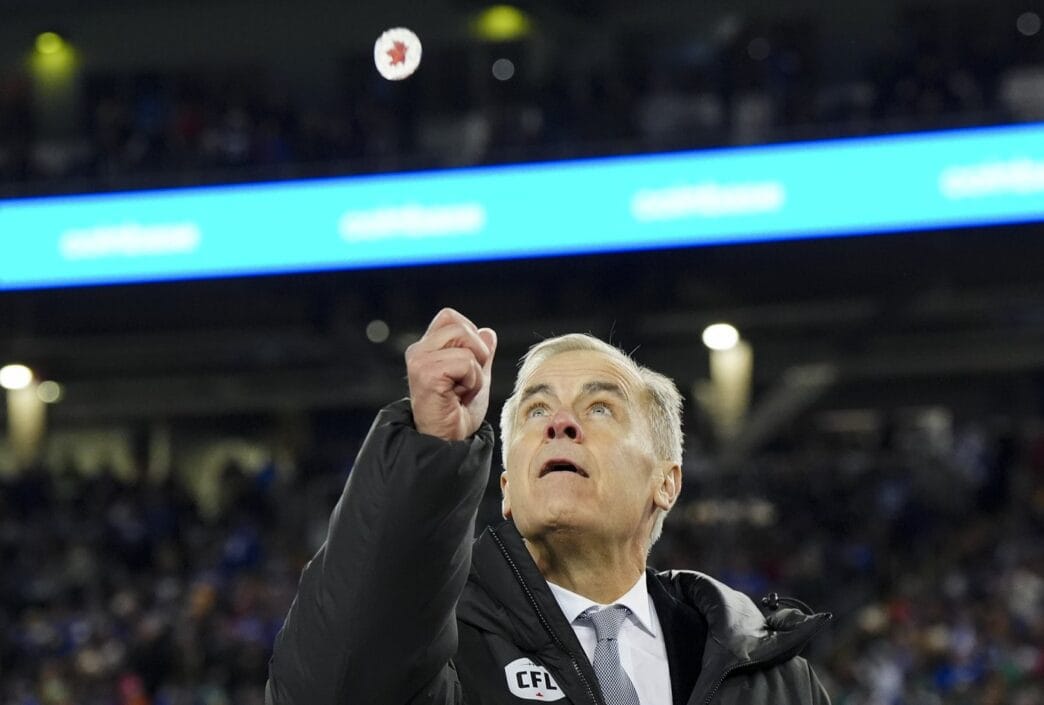 Aggregator Downloaded image for imported item 85594 | Meridian Source Prime Minister Mark Carney met with cheers and boos at 112th Grey Cup game