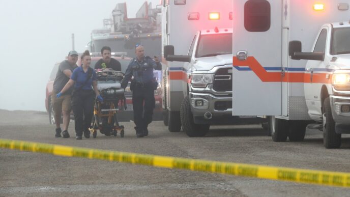 Emergency officials respond to a small plane crash near Galveston, Texas