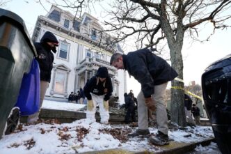 Search for the Brown University shooter resumes as questions swirl about campus security