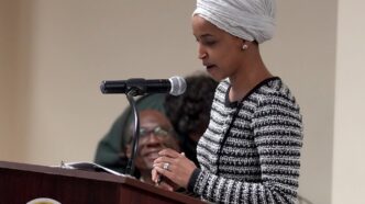 Aggregator Downloaded image for imported item 96063 | Meridian Source Man sprays unknown substance on Rep. Ilhan Omar and is tackled at Minneapolis town hall