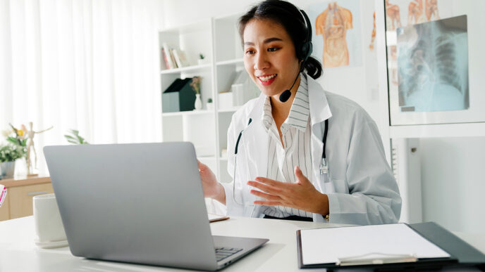 Young Asia lady doctor in white medical uniform with stethoscope | Meridian Source