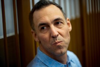 Russia frees French political scholar in a prisoner swap for a basketball player