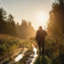 Silhouetted of a hunter with shotgun at beautiful sunset | Meridian Source