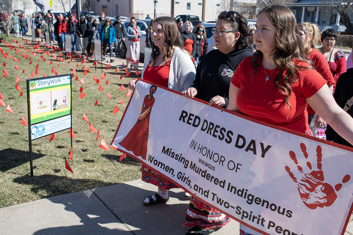 red dress protest Extinction Rebellion Staged a Funeral to Mark the End of London Fashion Week 2019