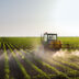 Tractor spraying soybean field | Meridian Source